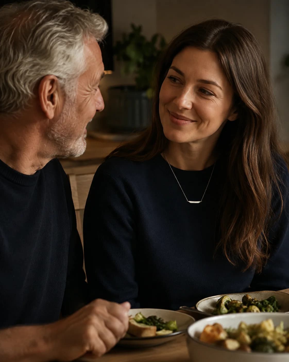 A daughter sharing dinner with her father